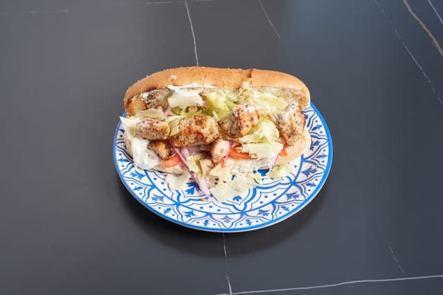 Chicken Souvlaki Sandwich prepared by Greek Mansion