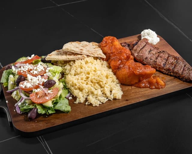 Steak Dinner prepared by Greek Mansion